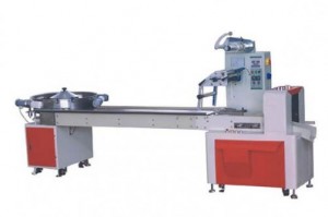Flow packing machine